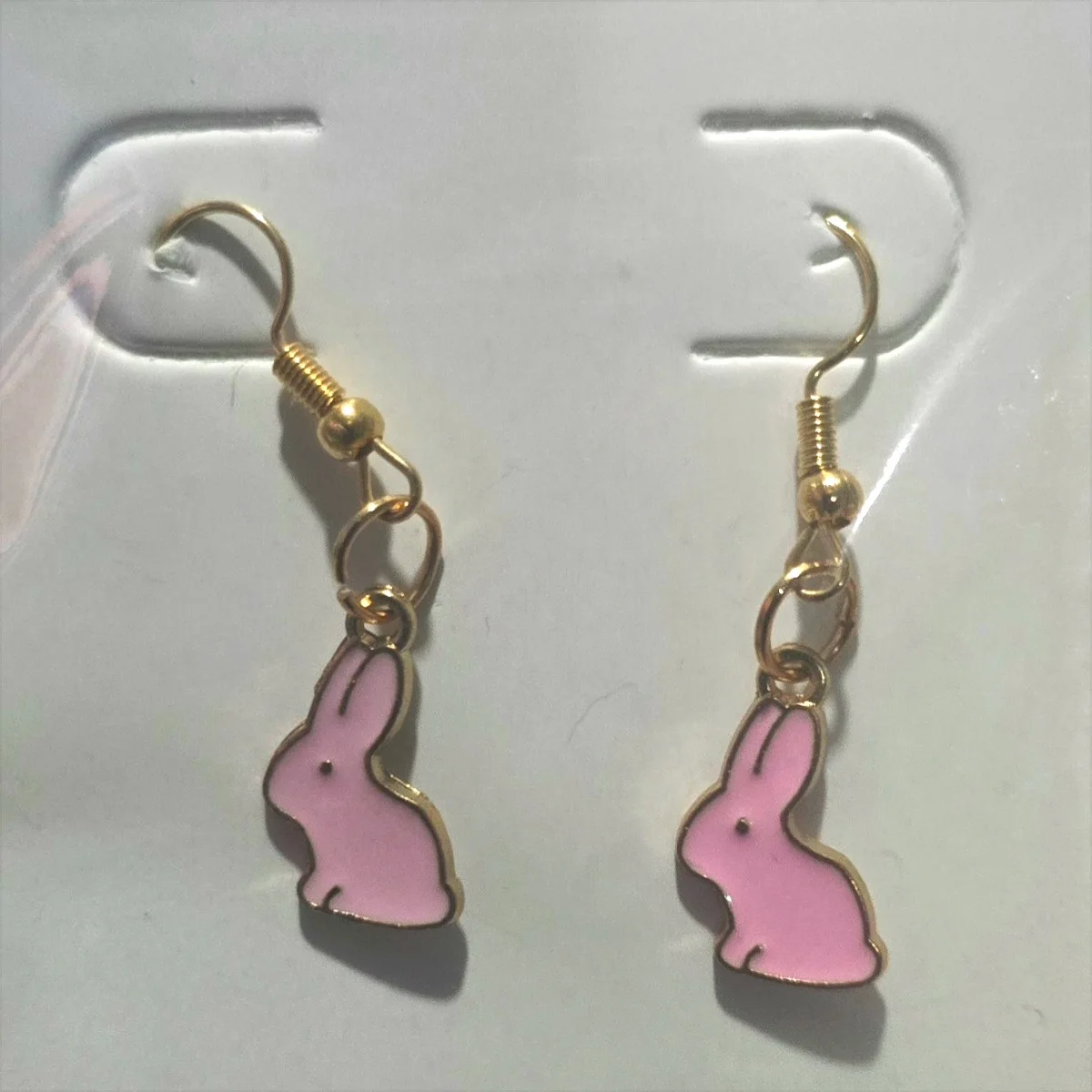 Aretes de conejo rosa